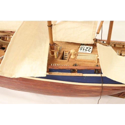 2485 - Wooden static kit built model of HMS Bounty with cutaway hull showing below decks, L: 90 cm. Not ava... 