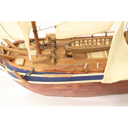 2485 - Wooden static kit built model of HMS Bounty with cutaway hull showing below decks, L: 90 cm. Not ava... 