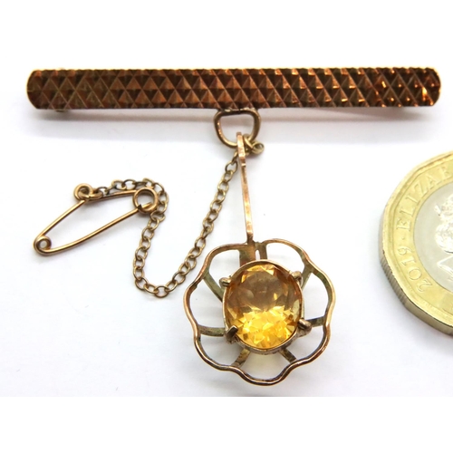16 - 9ct gold bar brooch with cage set citrine solitaire, 5.9g. P&P Group 1 (£14+VAT for the first lot an... 