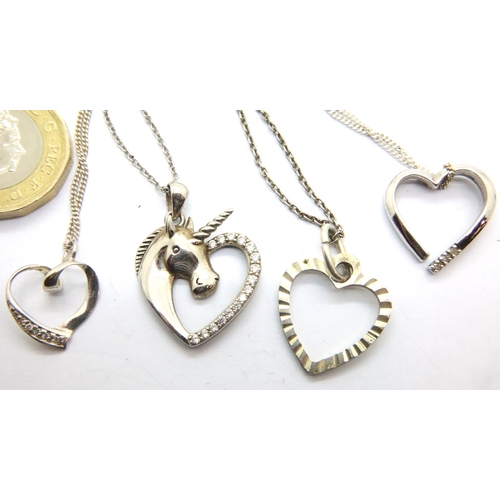 39 - Four silver heart necklaces, two stone set. P&P Group 1 (£14+VAT for the first lot and £1+VAT for su... 
