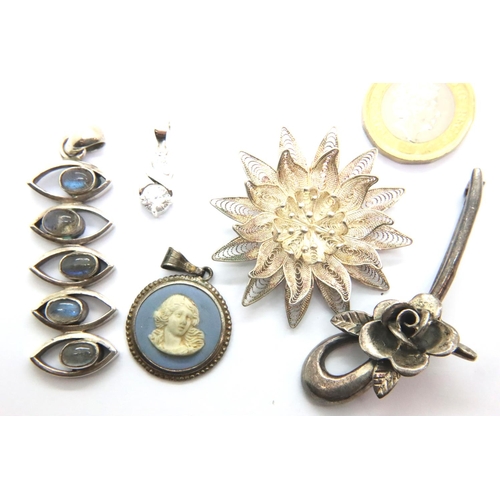 4 - Two silver brooches and three silver pendants, combined 40g. P&P Group 1 (£14+VAT for the first lot ... 