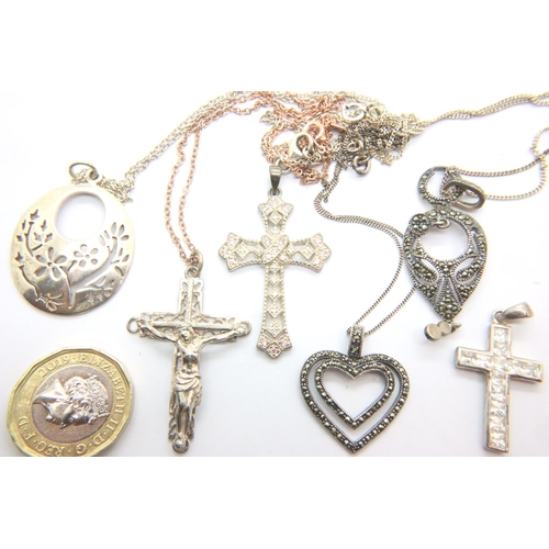 44 - Three 925 silver pendant necklaces, crucifix pendant necklace and two stone-set silver cross pendant... 