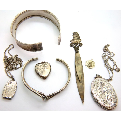 60 - Three hallmarked silver locket pendants, two bangles and a silver plate book/page marker. P&P Group ... 