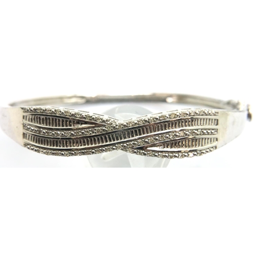 61 - 925 silver stone set bangle, D: 6 cm. P&P Group 1 (£14+VAT for the first lot and £1+VAT for subseque... 