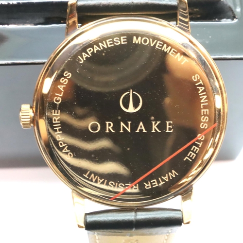 78 - Ornake gents wristwatch, new and boxed with black leather strap, black face, gold plated case. P&P G... 