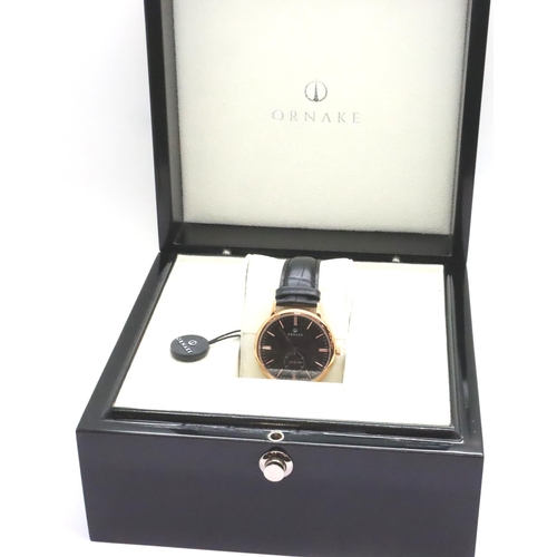 78 - Ornake gents wristwatch, new and boxed with black leather strap, black face, gold plated case. P&P G... 