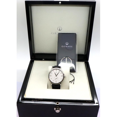 84 - New and boxed Ornake gents wristwatch with white dial and leather strap. P&P Group 1 (£14+VAT for th... 