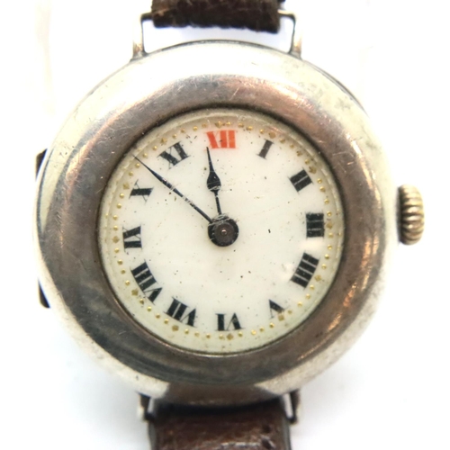 86 - 925 silver cased trench style wristwatch on brown leather strap, not working at lotting. P&P Group 1... 