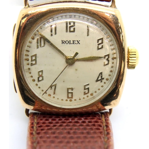 93 - 1950s 9ct gold Rolex wristwatch on leather strap in working order. P&P Group 1 (£14+VAT for the firs... 