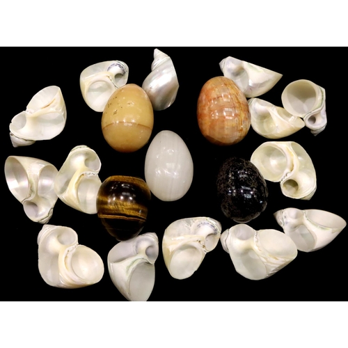 115 - Collection of abalone sea shells and five polished hardstone eggs including a tigers eye example. P&... 