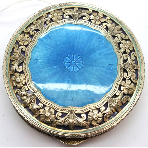 122 - White metal and blue enamel powder compact with pierced and engraved decoration, D: 75 mm. P&P Group... 