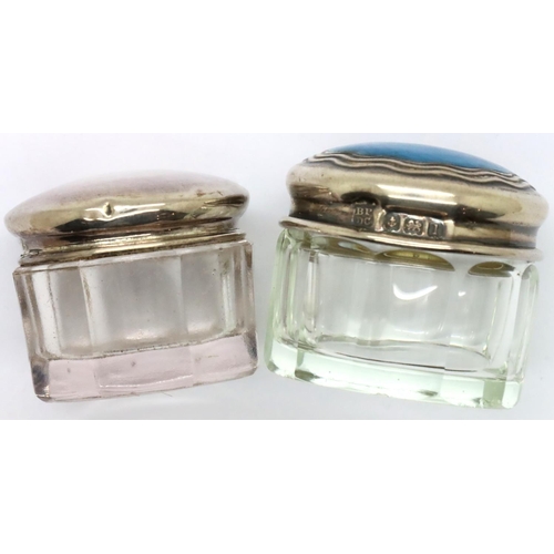136 - Two hallmarked sterling silver topped faceted glass dressing table pots. P&P Group 1 (£14+VAT for th... 