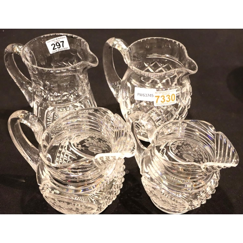 297 - Two large Stuart Crystal pitchers and two graduated cut and etched jugs. Not available for in-house ... 