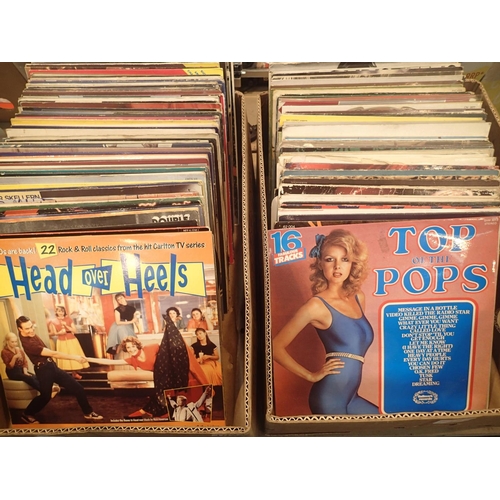 1023 - Two boxes of mixed records including John Lennon, Eric Clapton and Rod Stewart. Not available for in... 