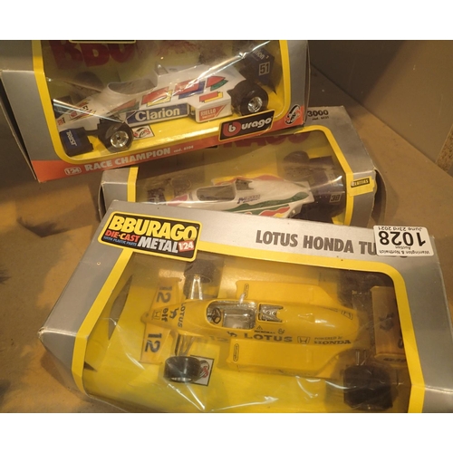 1028 - 3x Assorted Burago F1 1:24 Die Cast Cars - Boxes Worn. P&P Group 2 (£18+VAT for the first lot and £3... 