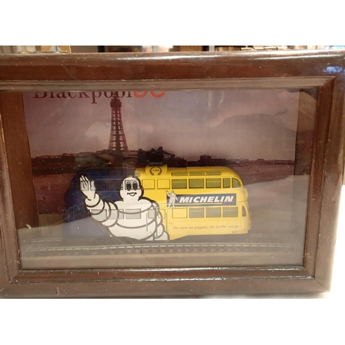 1092 - A Blackpool stationary Corgi  OO gauge tram carriage with a Michelin man in a wooden wall mounting d... 