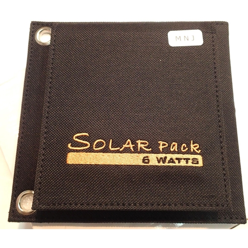 1094 - New old stock, 6 watt folding solar panel pack with one USB charging output. Integral part of case w... 