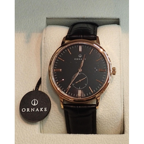 1127 - New old stock boxed gents Ornake wristwatch gold tone with black dial. P&P Group 1 (£14+VAT for the ... 