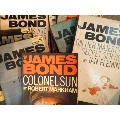 1147 - Nine paperback copies of James Bonds books Fleming and Robert Markham. P&P Group 1 (£14+VAT for the ... 