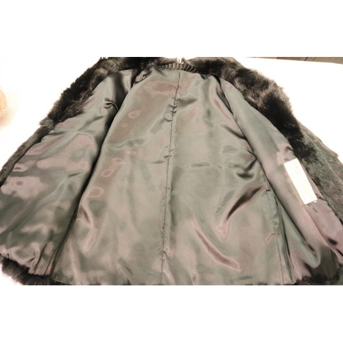 328A - Vintage black rabbit ladies fur coat, size S. P&P Group 2 (£18+VAT for the first lot and £3+VAT for ... 