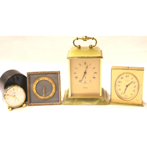 343 - Looping, an eight day eighteen jewel brass cased alarm clock, a further Looping travel clock, a Swiz... 