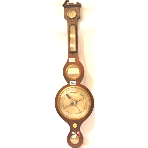 344 - An Edwardian walnut framed aneroid barometer with thermometer, mirror and level, H: 93 cm. Not avail... 