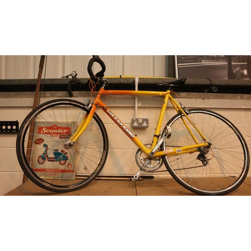 1003 - Cannondale CAAD 2 road bike, 24 inch frame, 26 inch wheels and 16 gears.  Not available for in-house... 