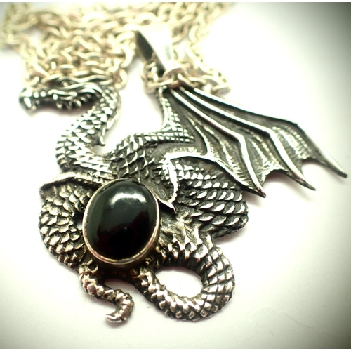 51 - Silver dragon pendant with black onyx on a silver chain. P&P Group 1 (£14+VAT for the first lot and ... 