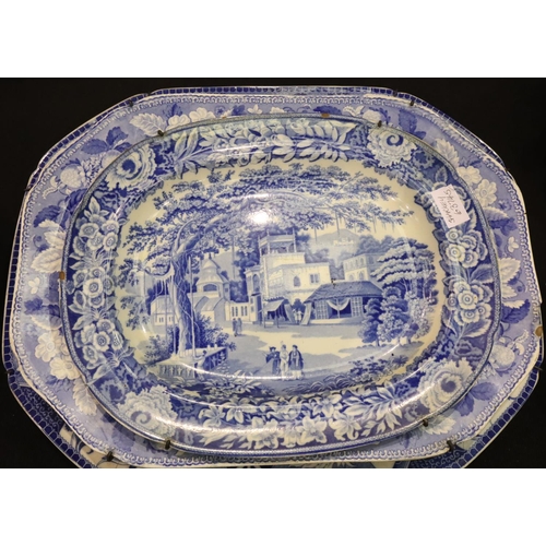 244 - Four graduated 19th century meat platters of varying design, largest (with old staple repair), 52 x ... 