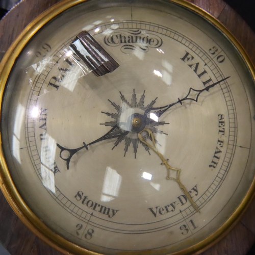 344 - An Edwardian walnut framed aneroid barometer with thermometer, mirror and level, H: 93 cm. Not avail... 