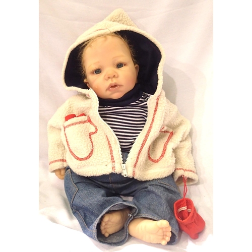 2167 - Life like baby boy doll blue outfit red trimmed white hoodie, H: 50 cm. P&P Group 2 (£18+VAT for the... 