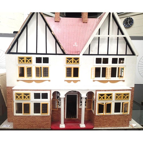 2182 - Wooden dolls house 85 x 36 x 75 cm H, hallway and five rooms, fitted lights, paper over wood constru... 