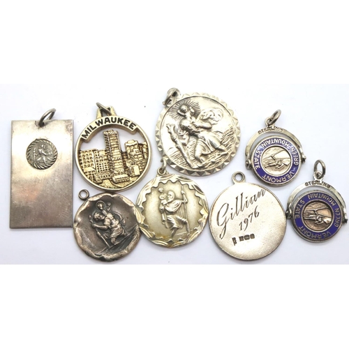 56 - Eight silver fobs including St Christophers medals, combined. P&P Group 1 (£14+VAT for the first lot... 