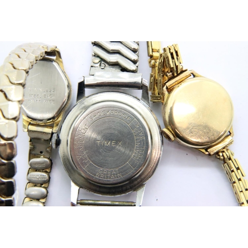 62 - A gents Timex wristwatch and two vintage ladies wristwatches. P&P Group 1 (£14+VAT for the first lot... 