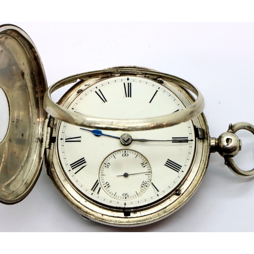 64 - Hallmarked silver half hunter pocket watch, not working at lotting. P&P Group 1 (£14+VAT for the fir... 