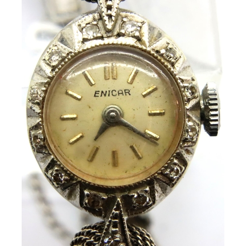 67 - Ladies 9ct white gold diamond set cocktail wristwatch on a plated bracelet. P&P Group 1 (£14+VAT for... 