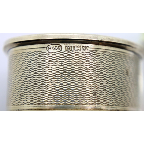 116 - Four hallmarked silver napkin rings. P&P Group 1 (£14+VAT for the first lot and £1+VAT for subsequen... 