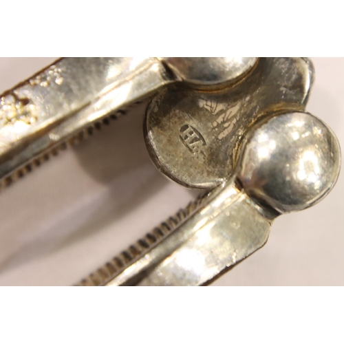 117 - Two pairs of Victorian silver-plated grape scissors, a hallmarked silver knife with mother of pearl ... 