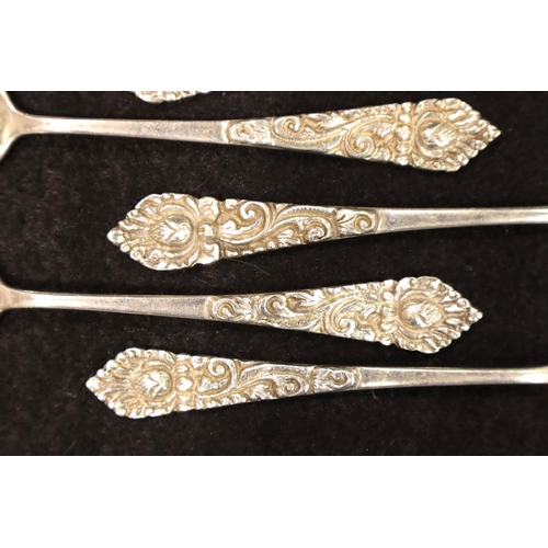 118 - A set of twelve continental 800 silver teaspoons with sugar spoon, each relief decorated and marked ... 