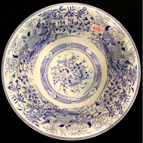 154 - Mintons, a substantial wash bowl decorated in blue over white, D: 29 cm. Not available for in-house ... 