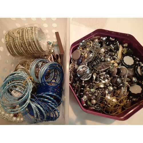 1098 - Two boxes of mixed costume jewellery including bracelets, bead necklaces etc. Not available for in-h... 