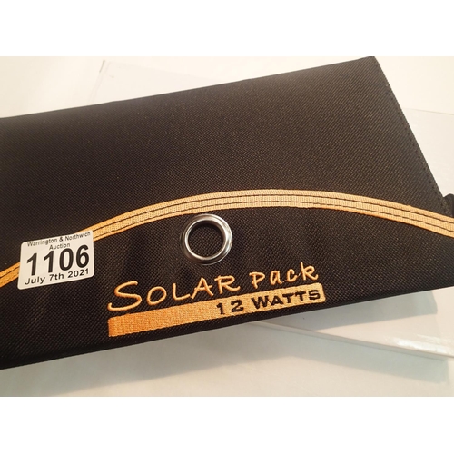 1106 - New old stock, 12 watt folding solar panel pack with two USB charging outputs. Integral part of case... 