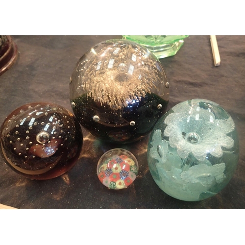 1227 - Four paperweights to include Victorian floral dump glass. Not available for in-house P&P, contact Pa... 