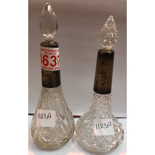 1123A - Two Victorian silver bound glass perfume bottles. P&P Group 1 (£14+VAT for the first lot and £1+VAT ... 