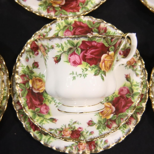 215 - Royal Albert Old Country Roses tea service comprising six trios with cake plate, milk jug and sugar ... 