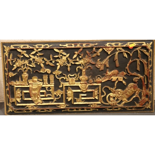 276 - Two carved and gilt Oriental panels, largest 32 x 65 cm, one with damage. Not available for in-house... 