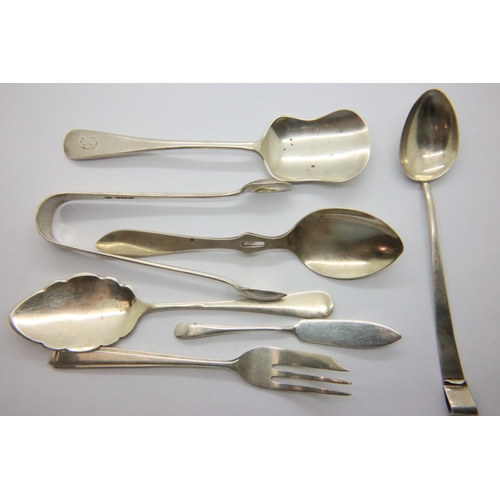 99 - Mixed hallmarked silver spoons and a pair of sugar nips, combined weight 137g. P&P Group 1 (£14+VAT ... 