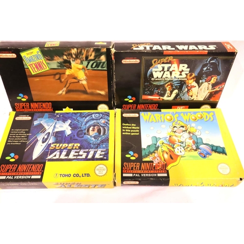 2311 - Four Super Nintendo games, Amazing Tennis, Super Aleste, Warios Woods and Super Star Wars, all cartr... 