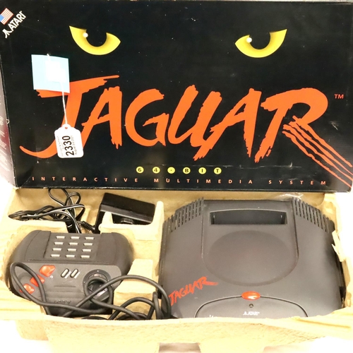 2330 - Atari Jaguar 64 bit Interactive Multimedia system with controller and power supply. P&P Group 3 (£25... 