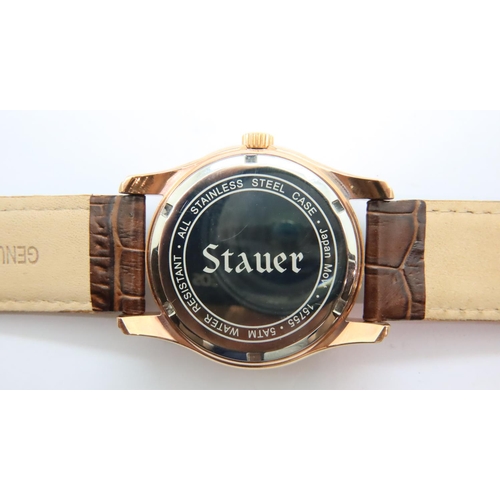 108 - Stauer; gents wristwatch with black dial, brown leather strap and gold plated case with box and oute... 